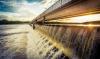 water flowing over dam