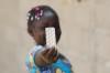 african girl with pill packet