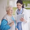 doctor with elderly patient