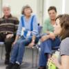 woman leading group discussion